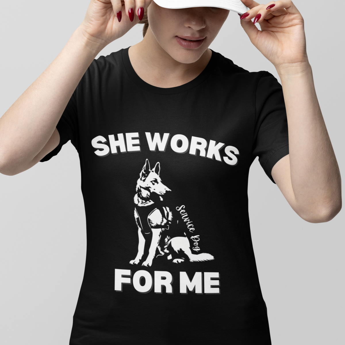 Woman wearing black She Works For Me German Shepherd service dog t-shirt, front view