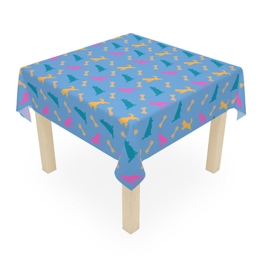Blue German Shepherd birthday tablecloth on party table, white background
