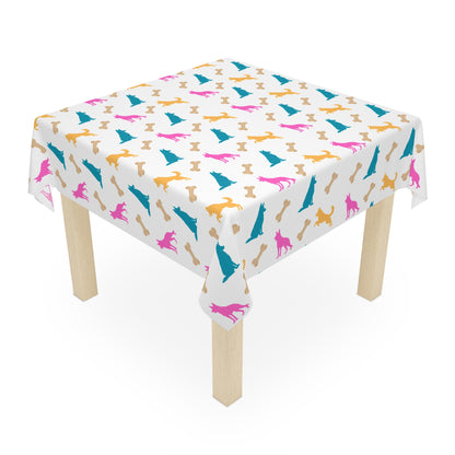 White German Shepherd birthday tablecloth on party table, white background