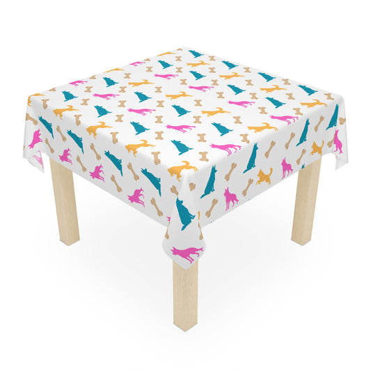 White German Shepherd birthday tablecloth on party table, white background