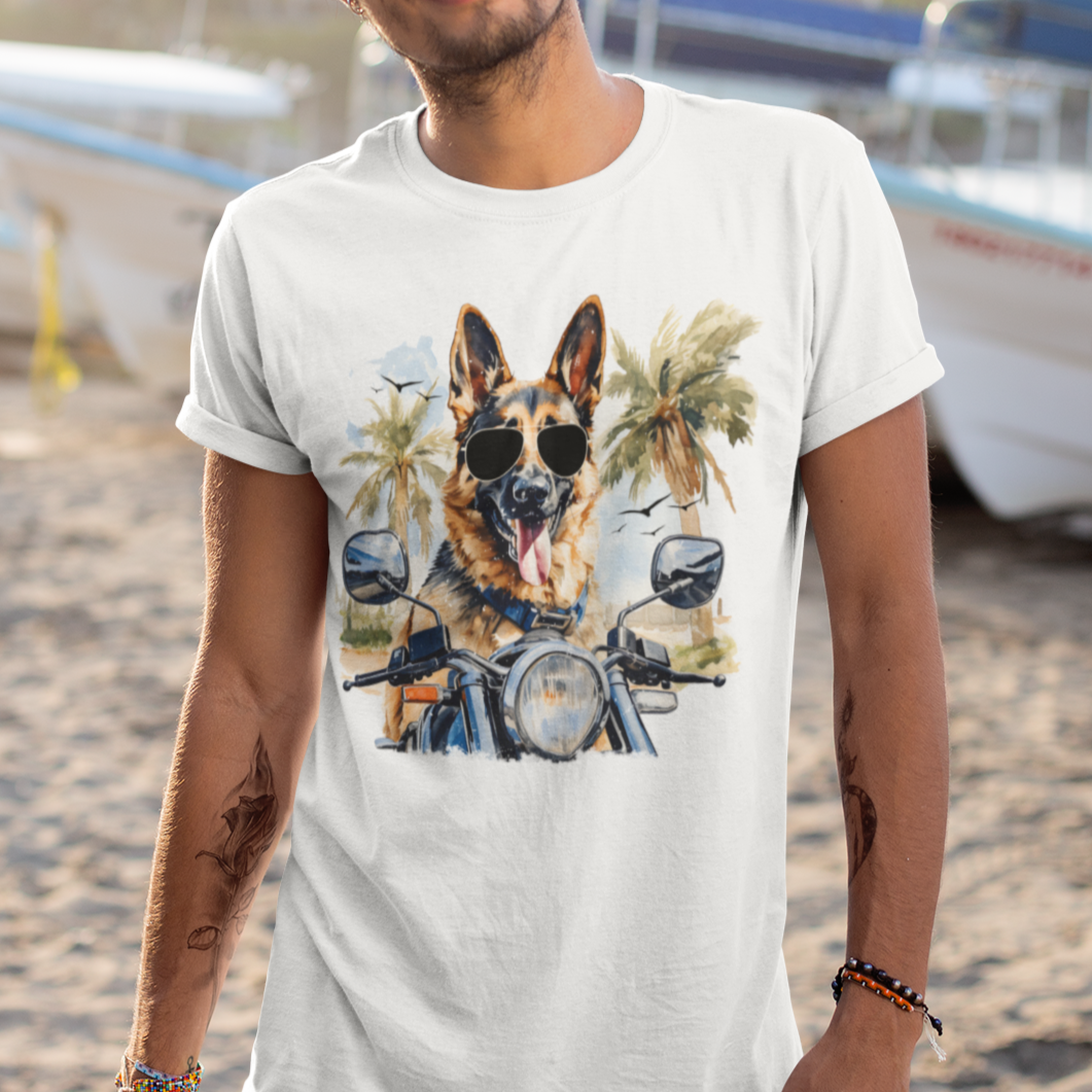 Man wearing white German Shepherd Motorcycle t-shirt at the beach, dog in sunglasses on bike