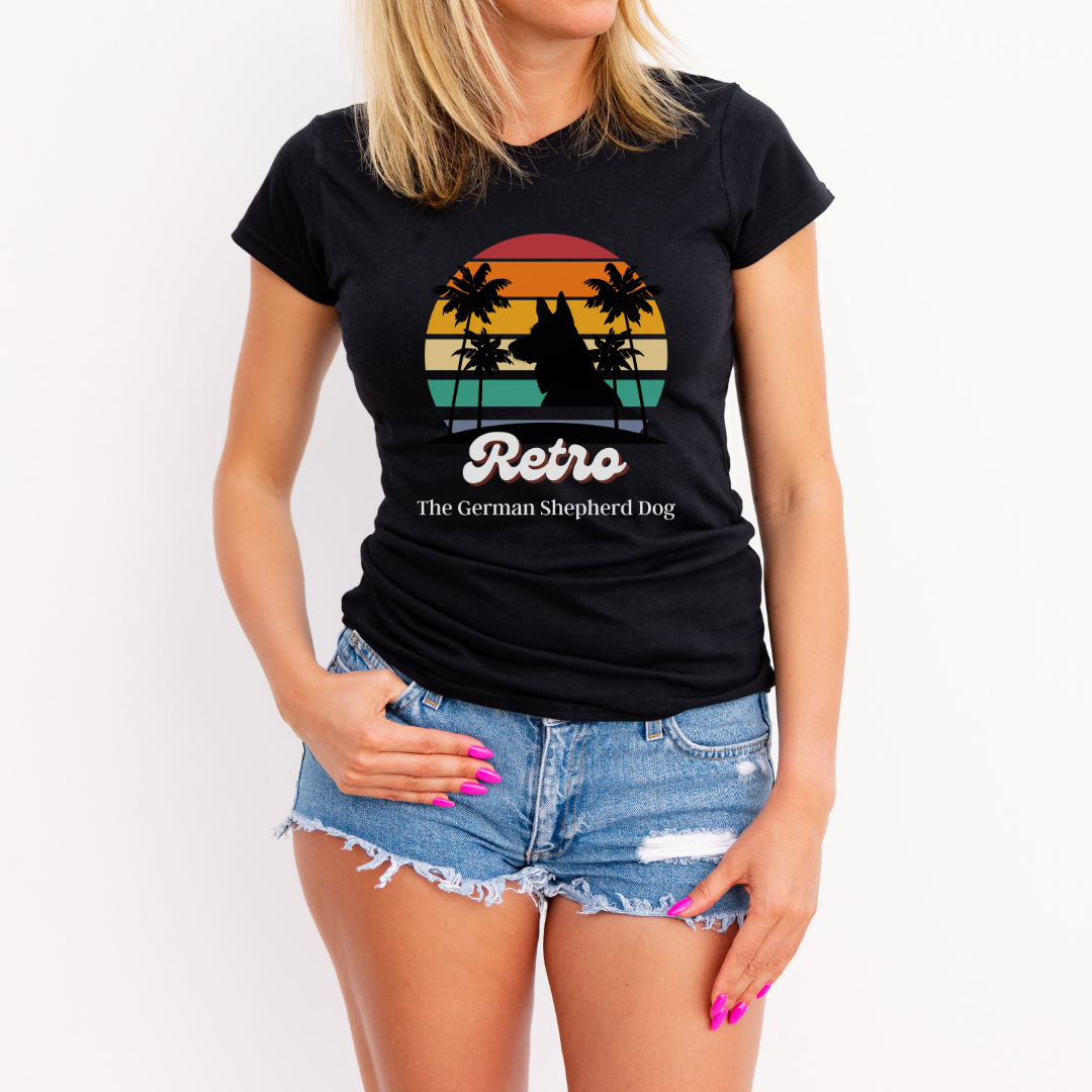 Woman wearing black Retro German Shepherd t-shirt with vintage sunset and palm trees