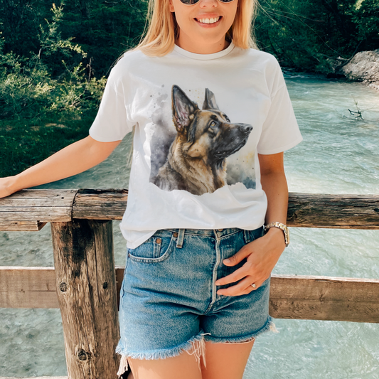 Woman wearing white watercolor German Shepherd t-shirt outdoors by the river