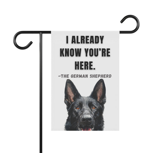 I Already Know You're Here funny black German Shepherd garden banner shown on stand, stand not included