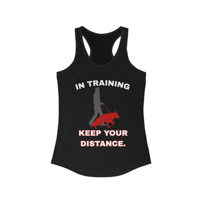 Front of black women's racerback tank top with handler and red German Shepherd, In Training text