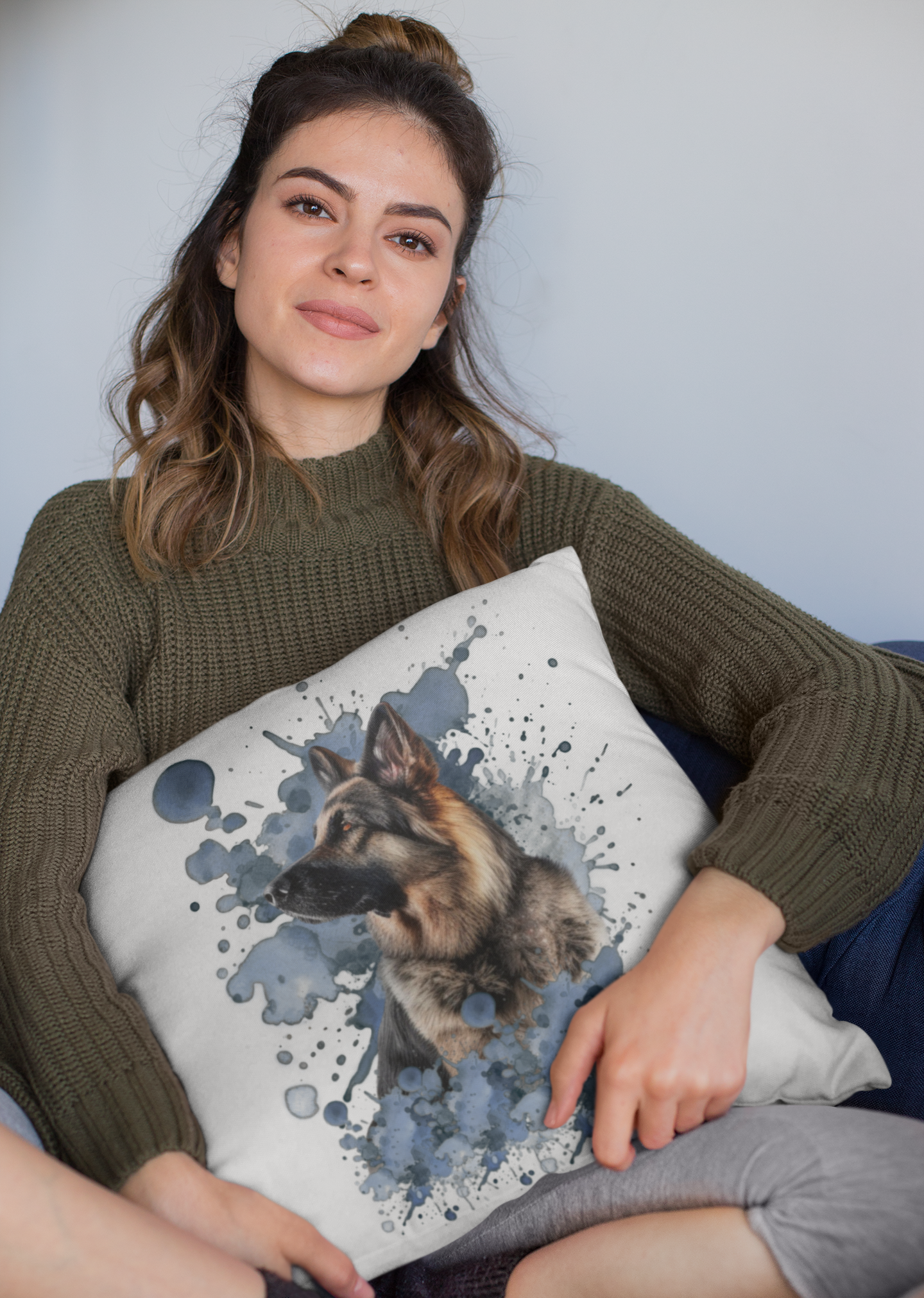 White pillow 16X 16 with a German Shepherd Dog looking ahead, blue background