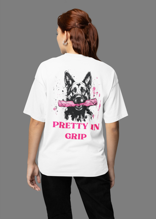 Woman's t-shirt with a German Shepherd holding a pink bite tug and the words Pretty In Grip