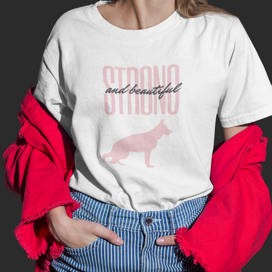 Woman wearing white Strong and Beautiful German Shepherd t-shirt with pink design